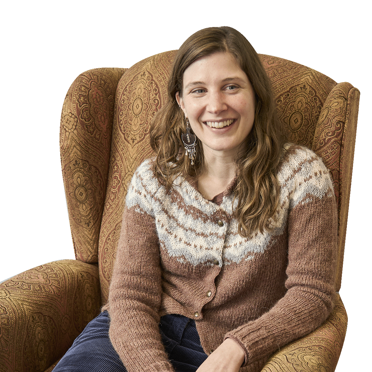 Food pantry volunteer takes a moment to smile for the camera while unloading boxes of fresh vegetables from the William Temple House delivery truck